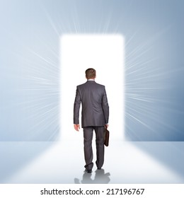 Businessman In Suit With Briefcase Stepping Through Door