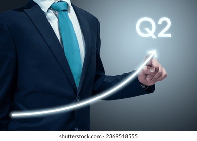Businessman in suit drawing business growth data chart with diagram, report on company investment progress, quarterly report, Q2 second quarter  - Powered by Shutterstock