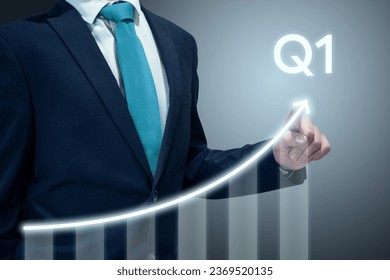 Businessman in suit drawing business growth data chart with diagram, report on company investment progress, quarterly report, Q1 first quarter - Powered by Shutterstock