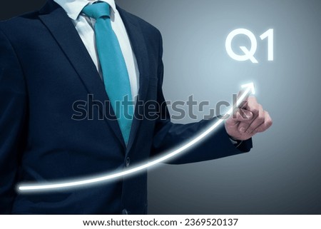 Businessman in suit drawing business growth data chart with diagram, report on company investment progress, quarterly report, Q1 first quarter