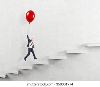 businessman in a suit flying happily holding a balloon over carrer ladder, white background, concept of success and career growth
