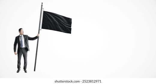 Businessman in a suit holding a black flag on a white background. Represents the concept of protest or rebellion in a professional setting - Powered by Shutterstock