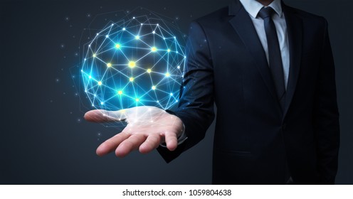 Businessman In Suit Holding Global Connection Symbol On His Hand