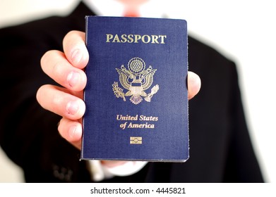 A Businessman In A Suit Holds A New (2007) US Passport!