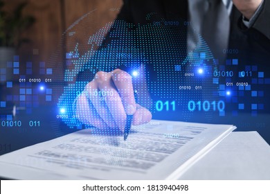 Businessman in suit signs contract. Double exposure with world map hologram. Man signing agreement international business concept.