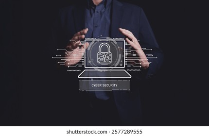 A businessman in a suit using hand gestures to protect a cybersecurity interface featuring a lock icon. Captured on a dark background, symbolizing security and technology.