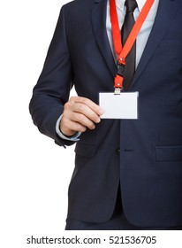 Businessman In Suit Wearing A Blank ID Tag Or Name Card On A Lanyard At An Exhibition Or Conference