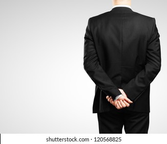 businessman in a suit's spending back