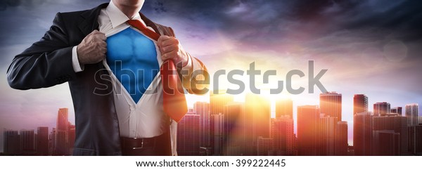 Businessman Superhero
With Sunset In
City
