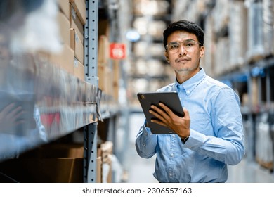 Businessman or supervisor uses a digital tablet to check the stock inventory in large warehouses, a Smart warehouse management system, supply chain and logistic network technology concept.
 - Powered by Shutterstock