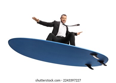 Businessman surfing on a surfboard isolated on white background - Powered by Shutterstock