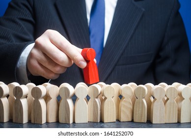 Businessman takes a red man out of a crowd of people. Finding the right person. Recruiting talented workers, headhunter, HR. Best choice. Search professionals specialists for open vacancies. - Shutterstock ID 1641252070