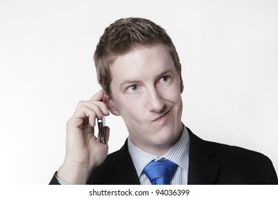 Businessman Taking A Call And He's Looks Like He Not Sure About Something