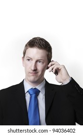 Businessman Taking A Call And He's Looks Like He Not Sure About Something