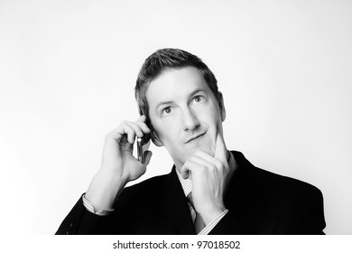 Businessman Taking A Call And He's Looks Like He Not Sure About Something