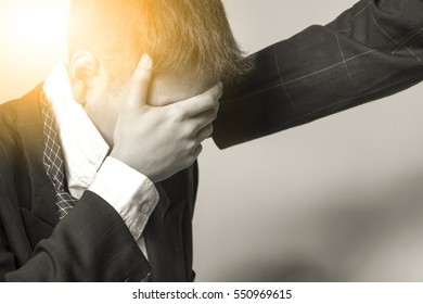 Businessman Taking His Hand On Face Himself Feeling Sad And Failure  In Business Financial And Another Businessman Give A Moral Support Black And White Color Under The Sunlight