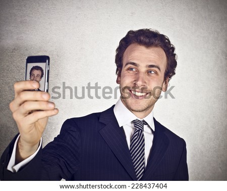 Businessman taking a selfie 