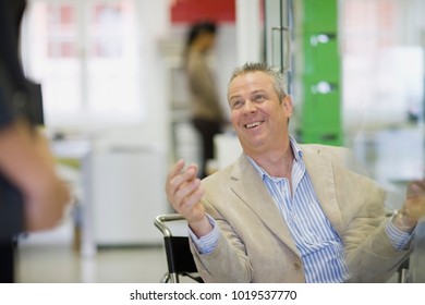 Businessman Talking In Office