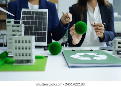 Businessman team brainstorming using tablet, laptop computer for working technology and business,  Renewable energy-based green businesses and global warming. Reduce CO2 emission. - Powered by Shutterstock