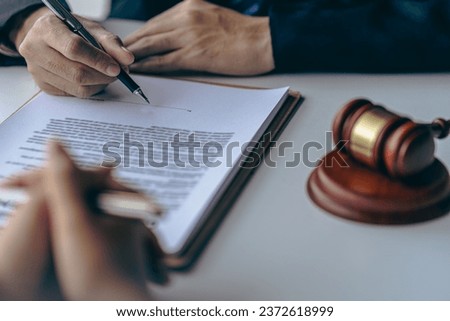 Businessman and team discuss with lawyer about contract documents to ensure correctness and confidence in joint business investment before signing contract, legal concept. Close-up pictures