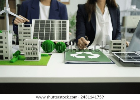 Businessman team using computer on CO2 emission reduction concept with global warming icon. along with climate, energy, sustainability, environment. 