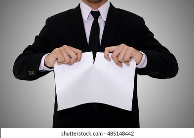 Businessman Tearing Blank Paper Apart