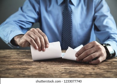 Businessman Tearing Contract.