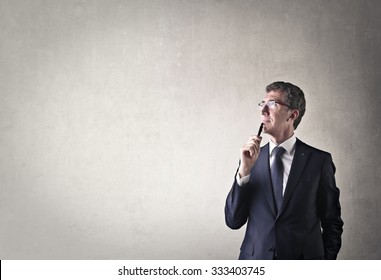 Businessman Thinking Of Something