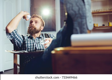 Businessman Throwing Paper In Trash Basket