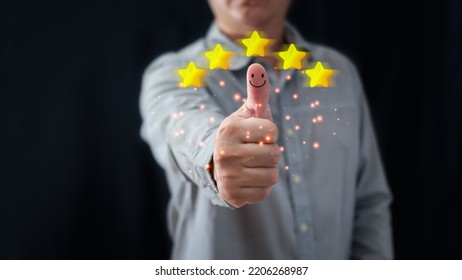 A Businessman Thumbs Up On The Happy Smiley Face Icon And Five Star To Give Satisfaction In Service.rating Very Impressed.Customer Service And Satisfaction Concept