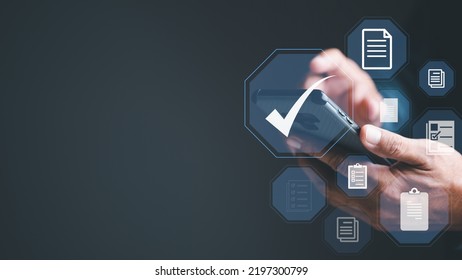Businessman ticks and checks documents online via smartphone, concept of rules of conduct, rules and policies, company articles of association. Terms and Conditions