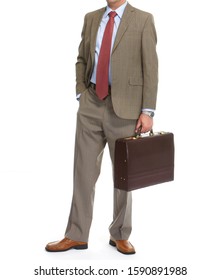 Businessman In A Tie With Brief Case. Isolated On White Background