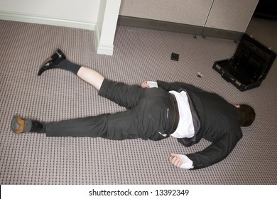 Businessman Totally Collapsed On Floor With Briefcase Open