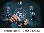 A businessman touch e-commerce and online shopping symbols, signifying the digital transformation of business through technology. Ideal for themes of online marketing, and digital economy.
