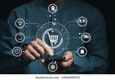 A businessman touch e-commerce and online shopping symbols, signifying the digital transformation of business through technology. Ideal for themes of online marketing, and digital economy.
 - Powered by Shutterstock