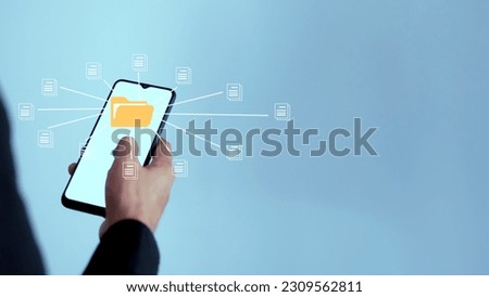 Businessman touch folder and document icon software on samrt phone, search and manage files online document database, Document management system concept