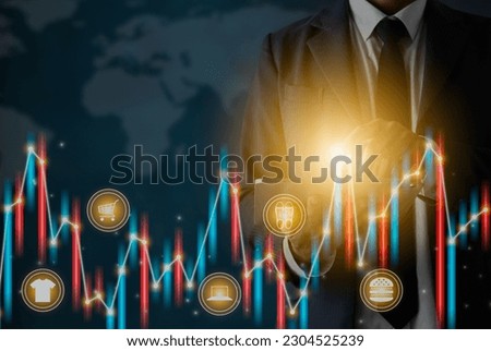 Businessman Touch Tablet and Dark Color Stock Graph,Online Products Icon,Bar Chart,Line Graph. Consumer Discretionary,Consumer Staples,Financial,Economic,Business and Technology Concept