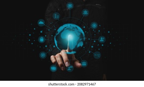 The businessman touches the projection of the planet. Concept of globality of customer network structure, data exchange connections, digital marketing, communication network and internet business. 
