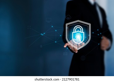 ํYoung Businessman Touches Shield Icon And Data Protection Cyber Security Privacy Business Internet Technology Concept. It Is A Technology To Protect Sensitive Information From Cyber Theft.