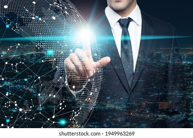 Businessman Touching 3d Graphic Earth With Light Effect. Global Business Around The World Concept. Hologram Of Globe And Network Connections In The Hands Of Businessmen. 