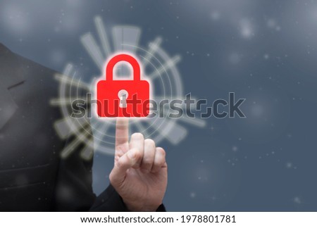 Businessman touching closed security lock on blurred digital technology background. Business, Cyber Security, unauthorized access, web technology, internet and networking concept