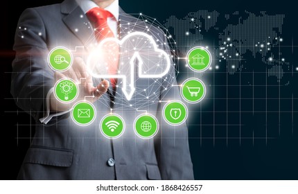 Businessman touching the cloud icon as a Cloud computing, Technology connectivity concept. Mixed media