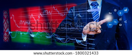 Businessman touching data analytics process system with KPI financial charts, dashboard of stock and marketing on virtual interface. With Belarus flag in background.