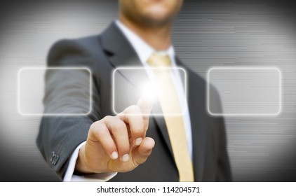 Businessman touching digital screen concept - Shutterstock ID 114204571