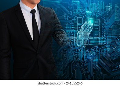 businessman touching glow electric circuit to access virtual network - Powered by Shutterstock - Get 15% off with code: PIKWIZARD15
