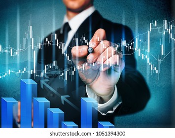 Businessman touching in graph - Shutterstock ID 1051394300