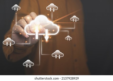 Businessman touching icon cloud computing and icons clouds network for download upload database of business to the future. Technology for download upload data information transformation concept.