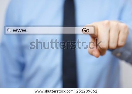 Businessman touching internet virtual search bar