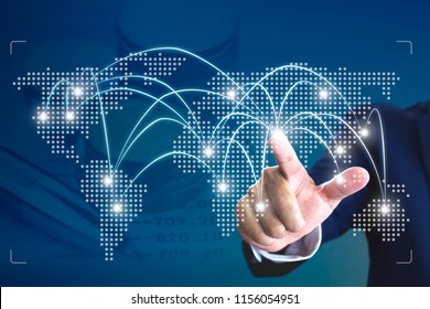 Businessman touching a starting point on a virtual map to turn on an operation for a business expansion around the world - Shutterstock ID 1156054951