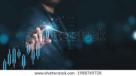 Businessman touching to stock market chart and graph for analysis investment, trader and value investor concept.